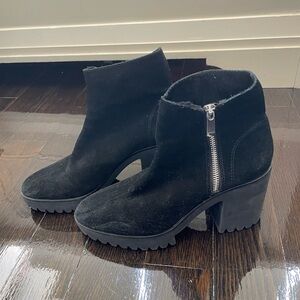 Black suade booties with heel.